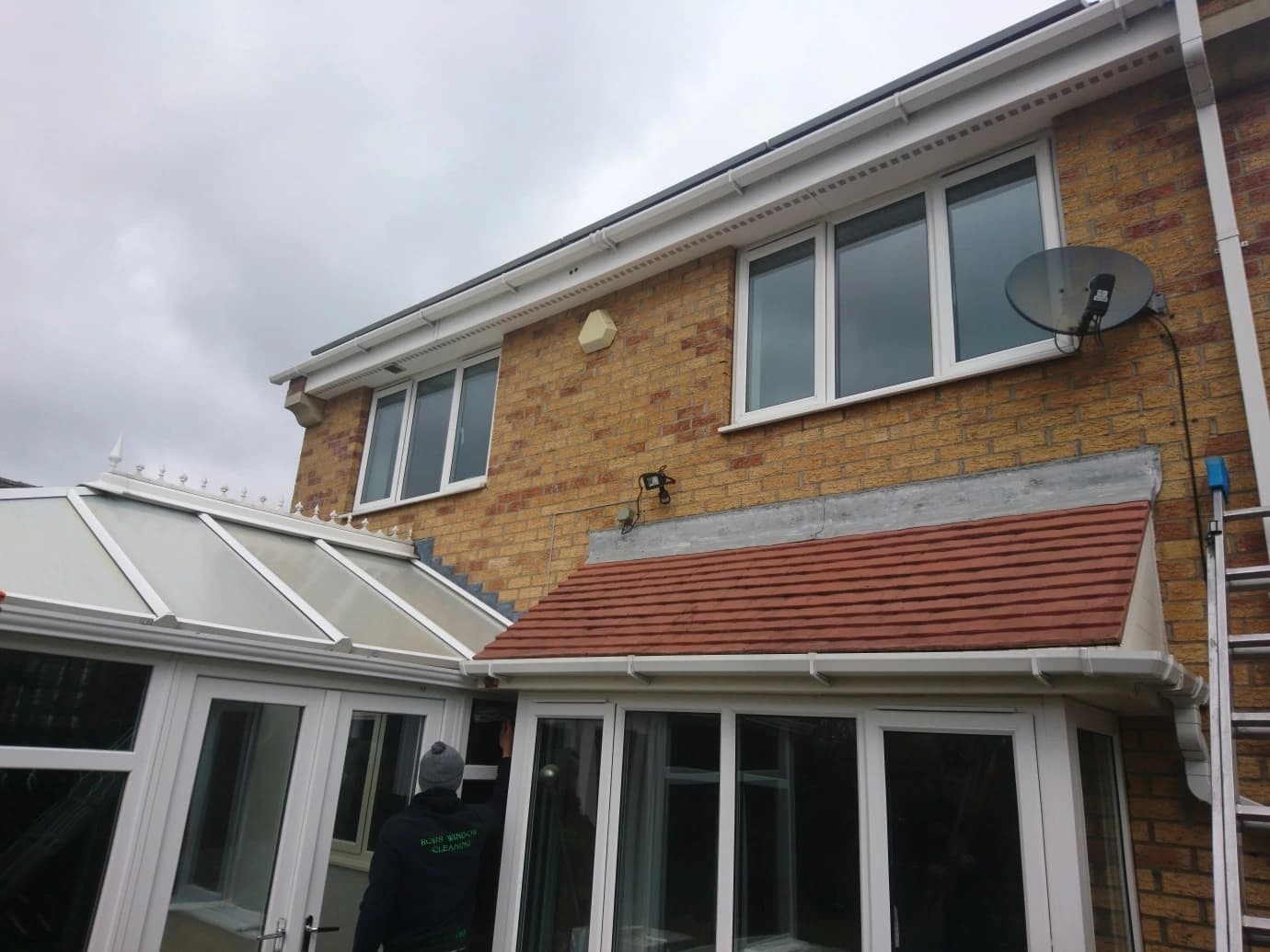 Terracotta clay roof tiles professionally cleaned and restored on a Liverpool property